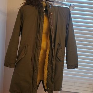 Zara Girls coat. Olive green and yellow bird-like soft and cozy interior.